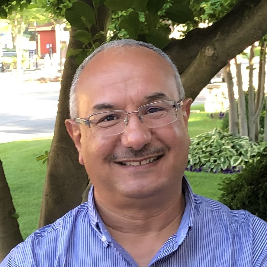 Ashraf Hassaballa smiles for the camera. 