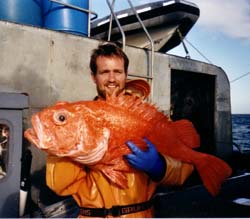 Scott Sherrill-Mix holds an enormous fish.